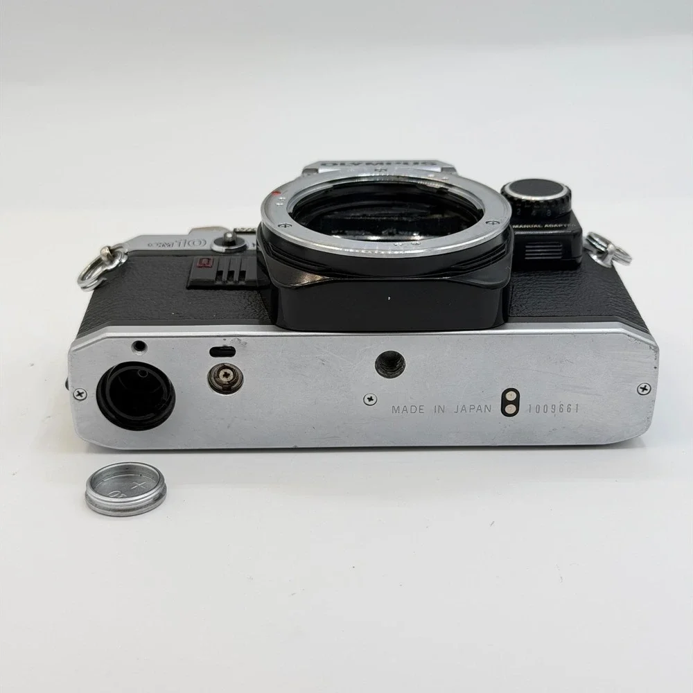 Olympus OM10 35mm Film SLR Camera Body Silver Black with Manual Adapter TESTED